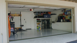A clean garage with a garage door threshold seal installed