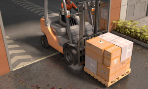 CGI Heavy Forklift going out of a warehouse protected with a 15mm commercial door threshold seal