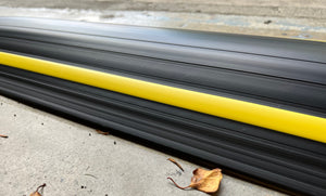 Close up of Garadam garage door flood barrier after rainfall showing it remained clean