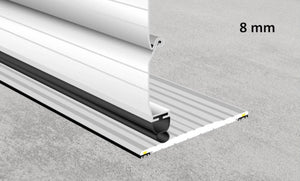 Illustration showing the industrial strength aluminium threshold seal under a roller shutter door